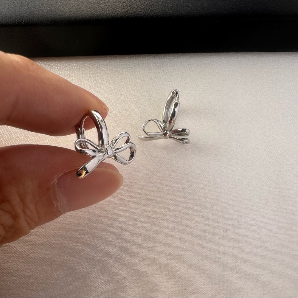 Huggie Bow Silver Hoop Earrings for Women - Picture 4 of 5